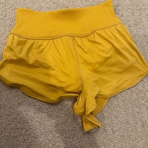 NWOT Free People Movement Game Day Shorts in Mustard Yellow